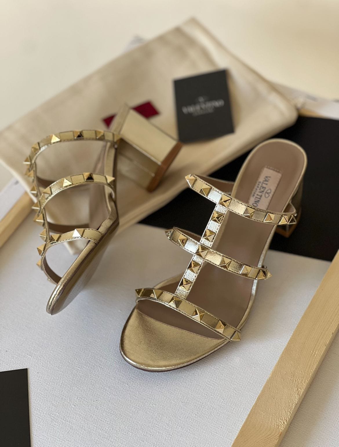 IMG-20251103-WA0053.jpg Valentino Rockstud Calfskin Leather Slide Sandal 60 mm Gold - Image 1