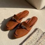 Hermès Oz Women's Leather Closed Toe Slippers in Brown