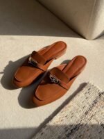 Hermès Oz Women's Leather Closed Toe Slippers in Brown