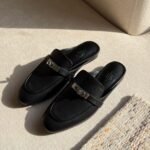 Hermès Oz Women's Leather Closed Toe Slippers in Black