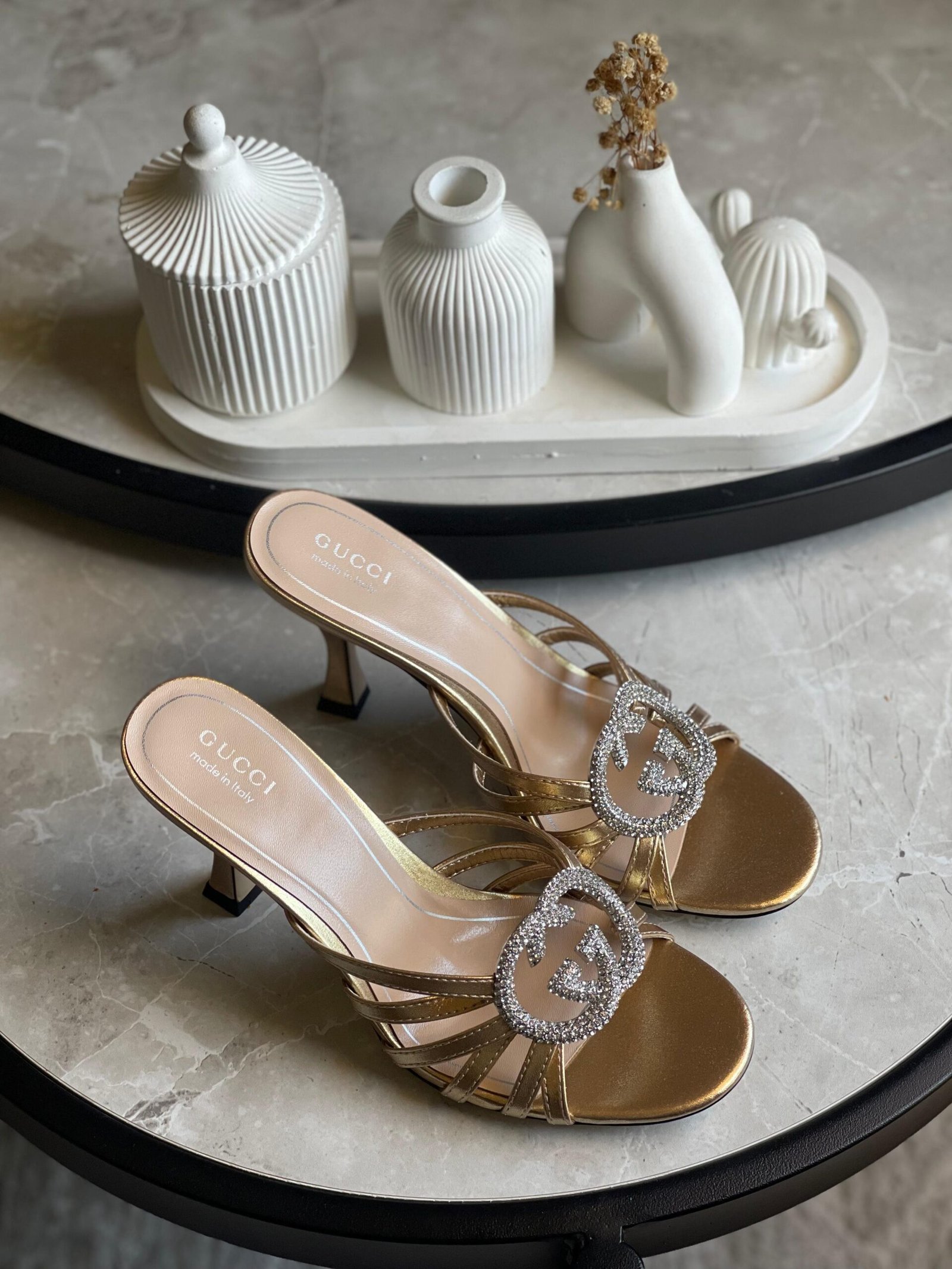 WhatsApp-Image-2026-03-06-at-10.49.00-PM-scaled-1.jpeg Gucci Alicia Strappy Slide Sandal In Gold Metallic - Image 1